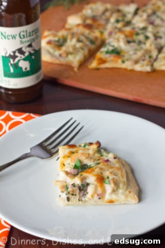 Roasted Garlic, Chicken & Herb White Pizza - Roasted garlic sauce topped with chicken, red onions, and herbs. A great white pizza that will rival any pizza out there!