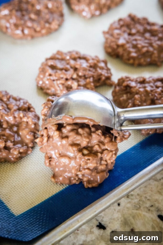 scooping star crunch cookies onto a baking tray
