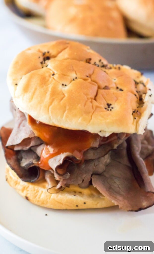 copycat arby's roast beef & cheddar sandwich on a white plate