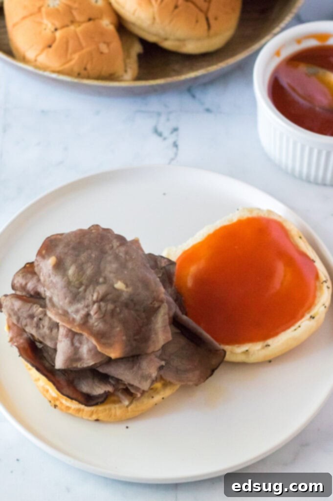 assembling roast beef sandwich