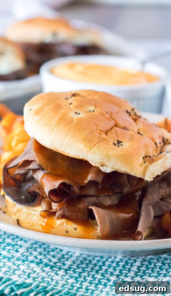 roast beef 7 cheddar sandwich on a white plate