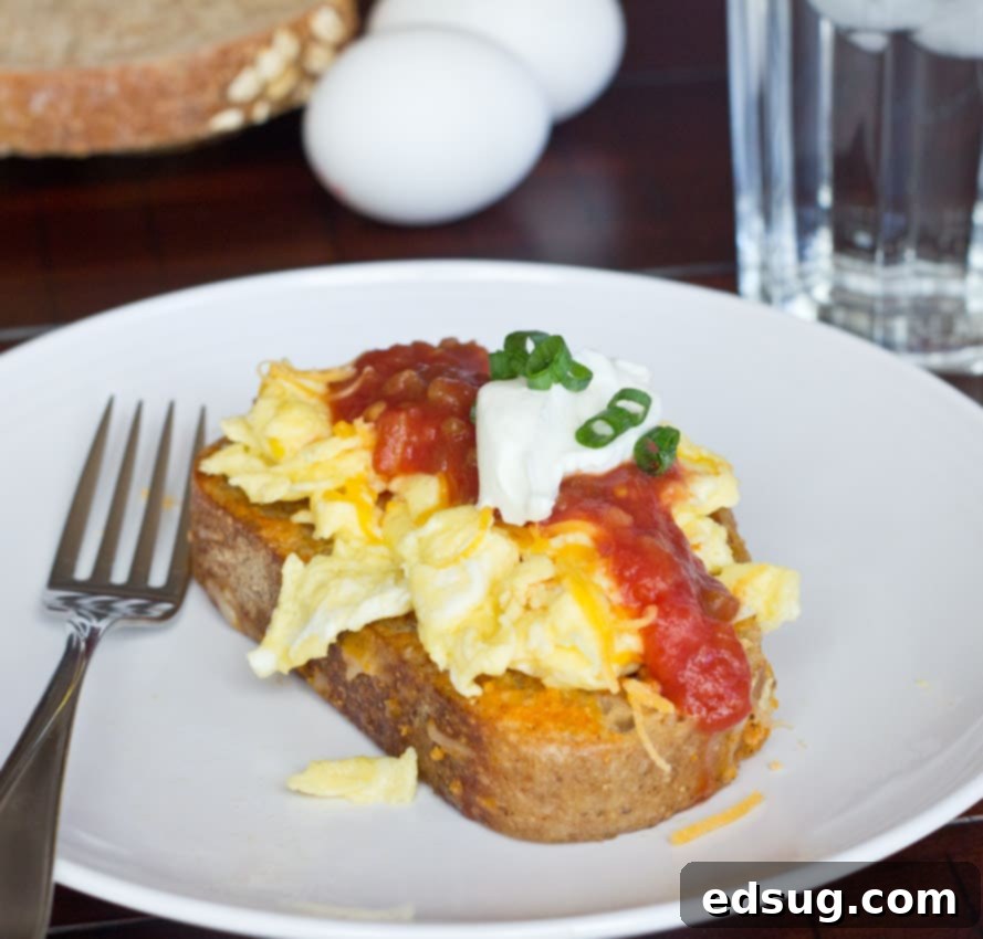 Savory French toast slices with cheese and egg, ready to be topped