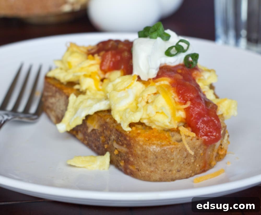 Spicy Chipotle French Toast stacked on a plate with various toppings