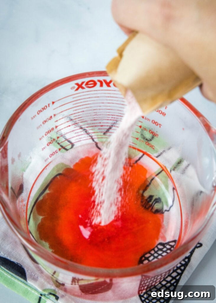 Patriotic Jello Shots 5 mixing red jello together