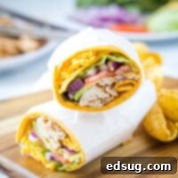 close up bbq chicken wrap cut in half