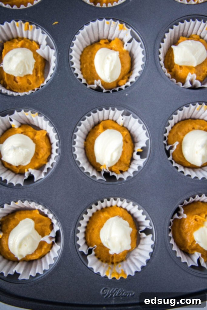 Pumpkin Cream Cheese Swirl Muffins 4 filling pumpkin muffins with cream cheese filling