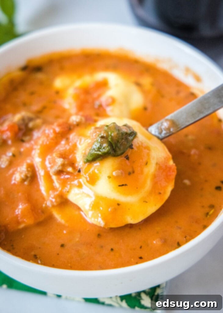 a spoon full of crock pot tortellini soup