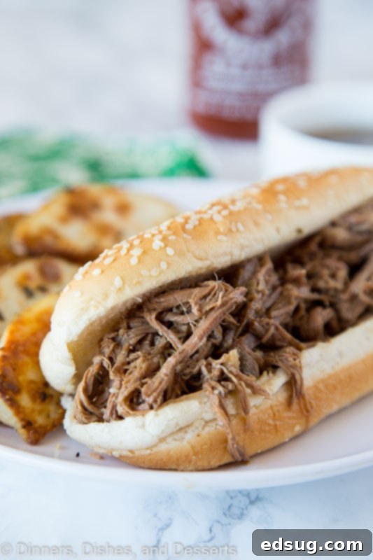 Slow Cooker French Dip - juicy tender beef cooked in a savory broth and served on a French roll. Au jus is great for dipping and make this crock pot recipe a staple in any house! Slow Cooker French Dip Recipe - Juicy tender beef cooked in a savory broth and served on a French roll. Au jus is great for dipping and makes this crock pot recipe a staple in any house!