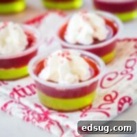 Merry & Bright Jello Shots 9 close up christmas jello shots with whipped cream