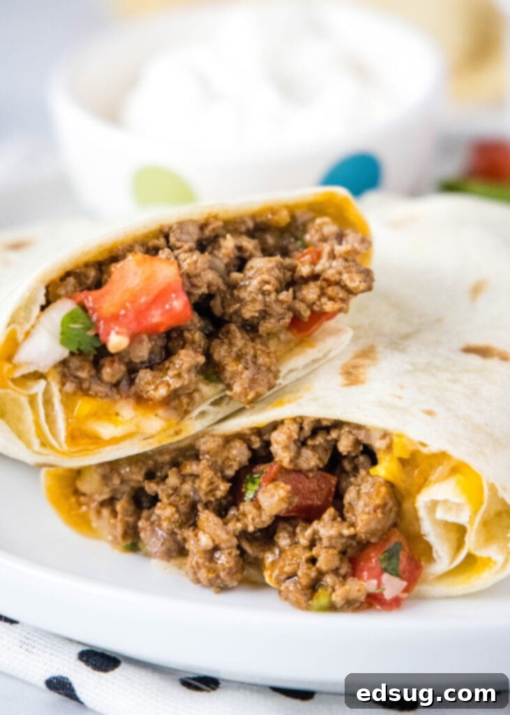 Taco Bell Copycat Meximelt Recipe 6 meximelt cut in half on a white plate