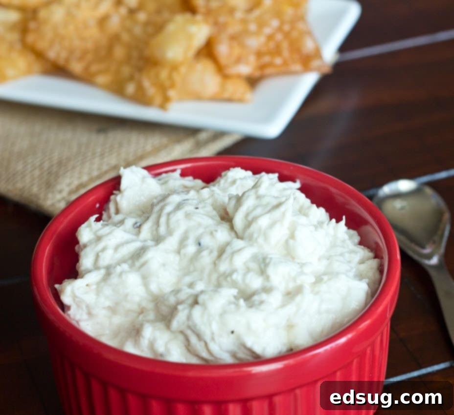 Crab Rangoon Dip crab rangoon dip in a bowl