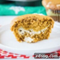 Gingerbread Cheesecake Swirl Muffins 7 close up cut in half muffin