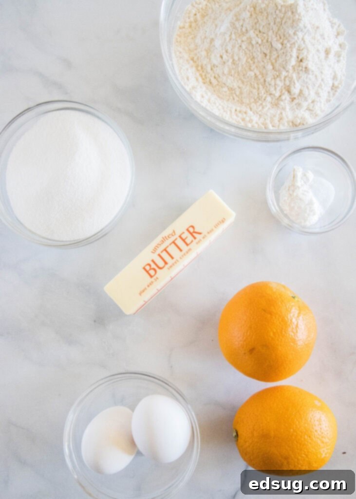 Zesty Orange Loaf 3 fresh orange bread ingredients laid out before baking