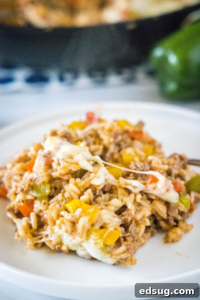 Hearty Stuffed Pepper Casserole 5 a white plate with stuffed pepper casserole on it