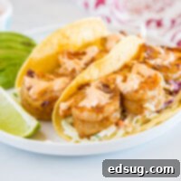 shrimp tacos on a plate, with Chipotle and Taco