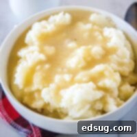 Foolproof Homemade Gravy 8 close up mashed potatoes and gravy in a bowl