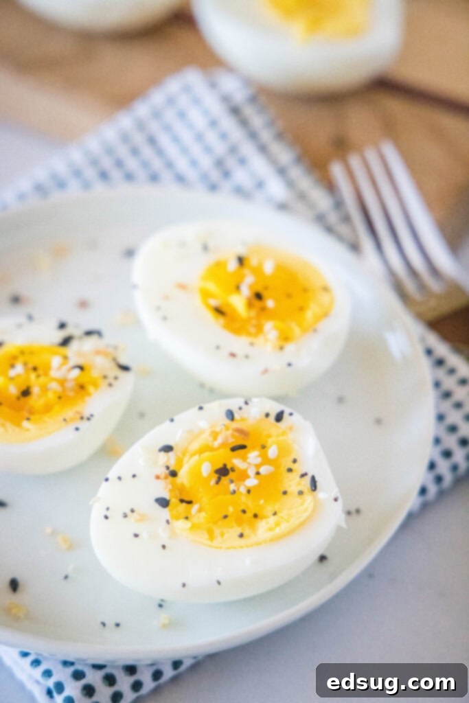 sliced hard boiled eggs on a white plate