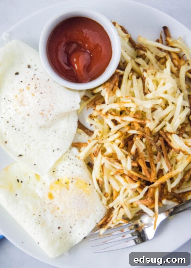 eggs and hash browns on a plate