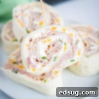 close up turkey pinwheel sandwich on a plate