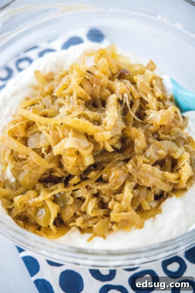 Slow Cooked Onion Perfection 6 Bowl of deep golden caramelized onions, ready to be served or stored.