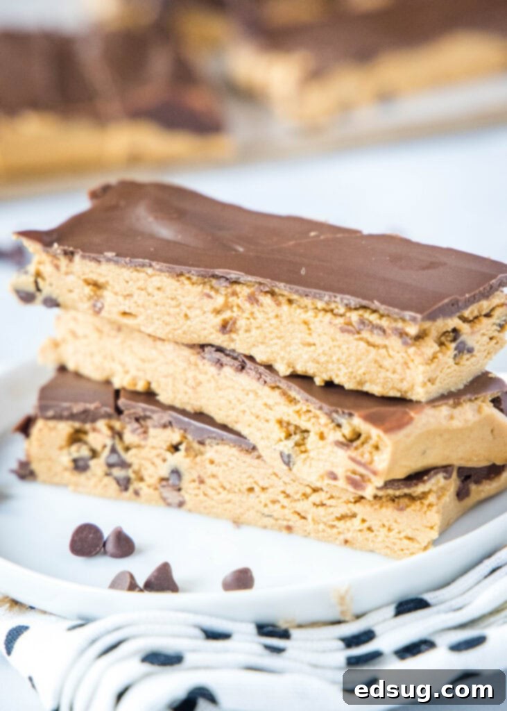 Power-Packed Peanut Butter Protein Bars 4 stacked homemade perfect bars on a white plate