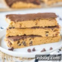 Power-Packed Peanut Butter Protein Bars 6 close up homemade perfect bars on a white plate