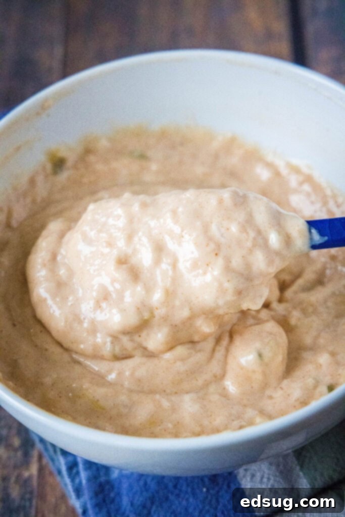 Zesty Island Dressing 5 thousand island dressing mixed together in a bowl