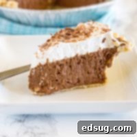 French Silk Pie 5 French Silk Pie - a rich and creamy chocolate pie with a layer of silky chocolate mousse topped with fresh whipped cream and chocolate shavings!