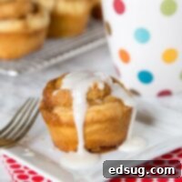 Cinnamon Swirl Muffins 6 Cinnamon Roll Muffins - the taste of a thick and gooey cinnamon roll in a quick and easy muffin. Ready in about 30 minutes, topped with a vanilla glaze, and perfect for breakfast!