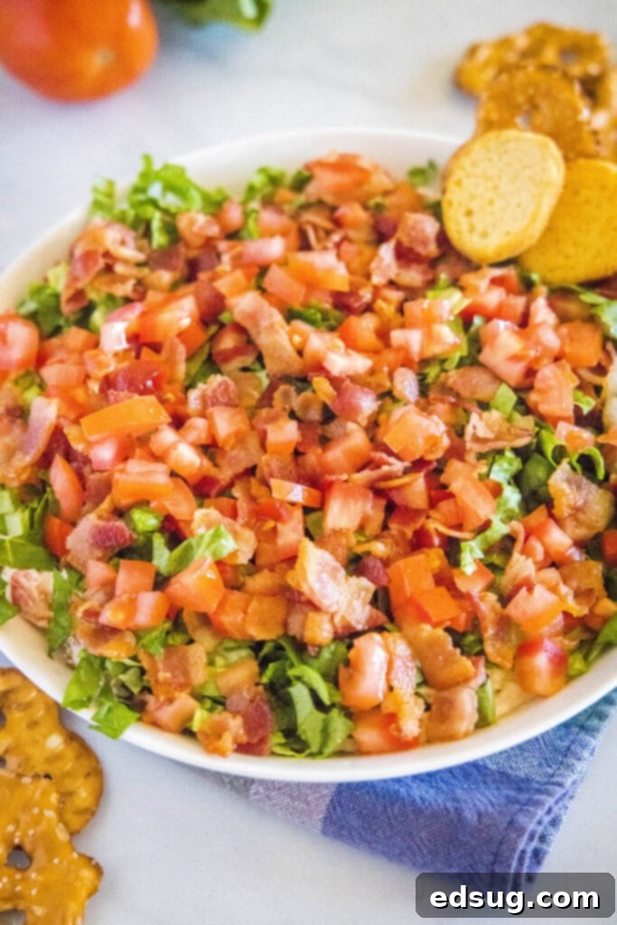blt dip with in a bowl with crackers