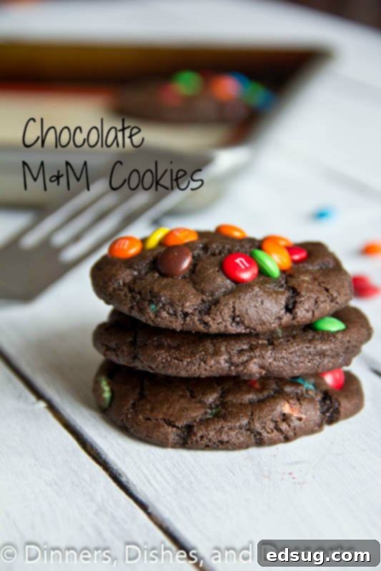 Super Thick Chocolate M&M Cookies Recipe A plate of super thick, chewy chocolate M&M cookies, bursting with colorful candies