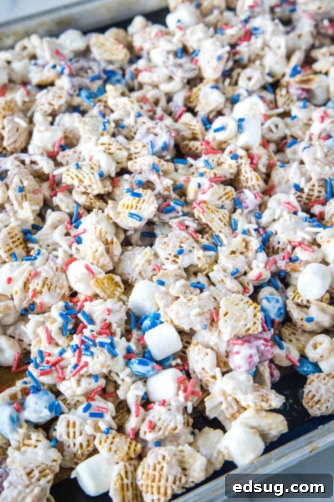 Stars & Stripes Party Blend 5 sprinkles on party mix on baking tray cooling