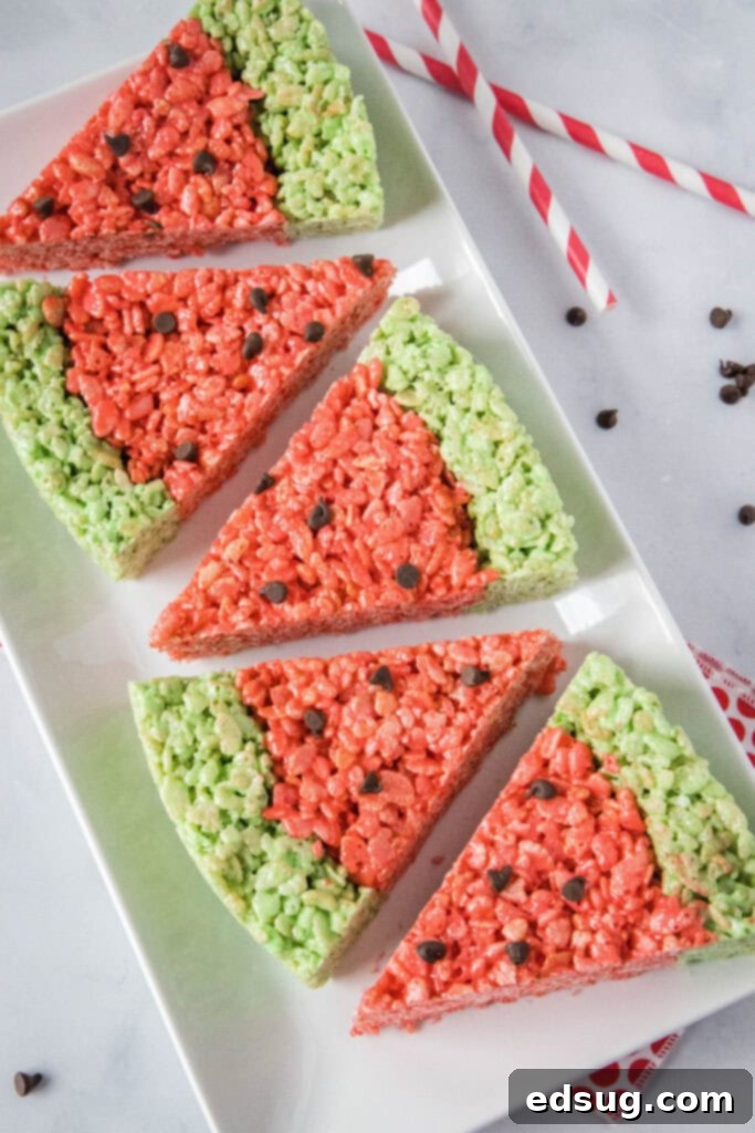 Watermelon Splash Krispies 8 a white plate with watermelon krispie treats