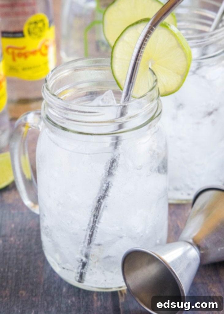 ranch water in a glass with a metal straw, ready to be enjoyed
