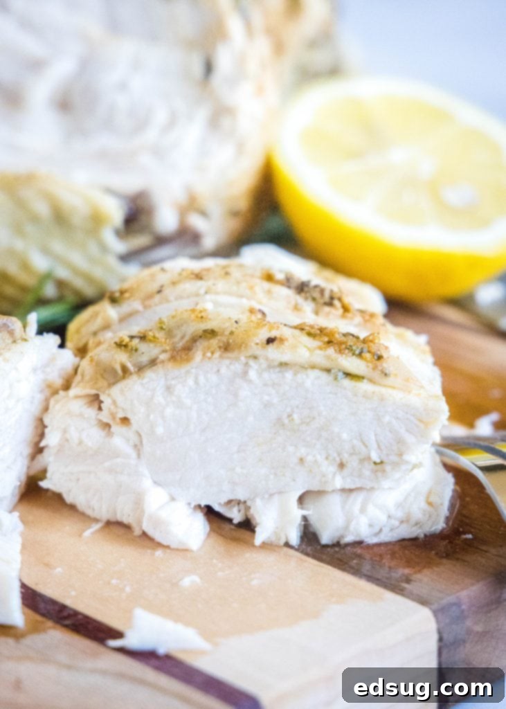 Perfect Instant Pot Whole Chicken 7 Sliced Instant Pot whole chicken on a cutting board, ready to serve