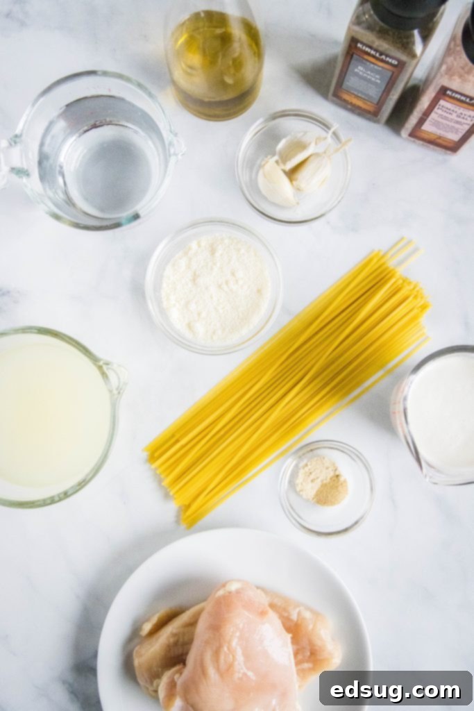 One Pot Wonder Chicken Alfredo 3 instant pot chicken alfredo ingredients laid out on a table