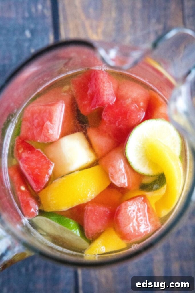 Sun-Drenched Sangria 4 looking into a pitcher of summer sangria