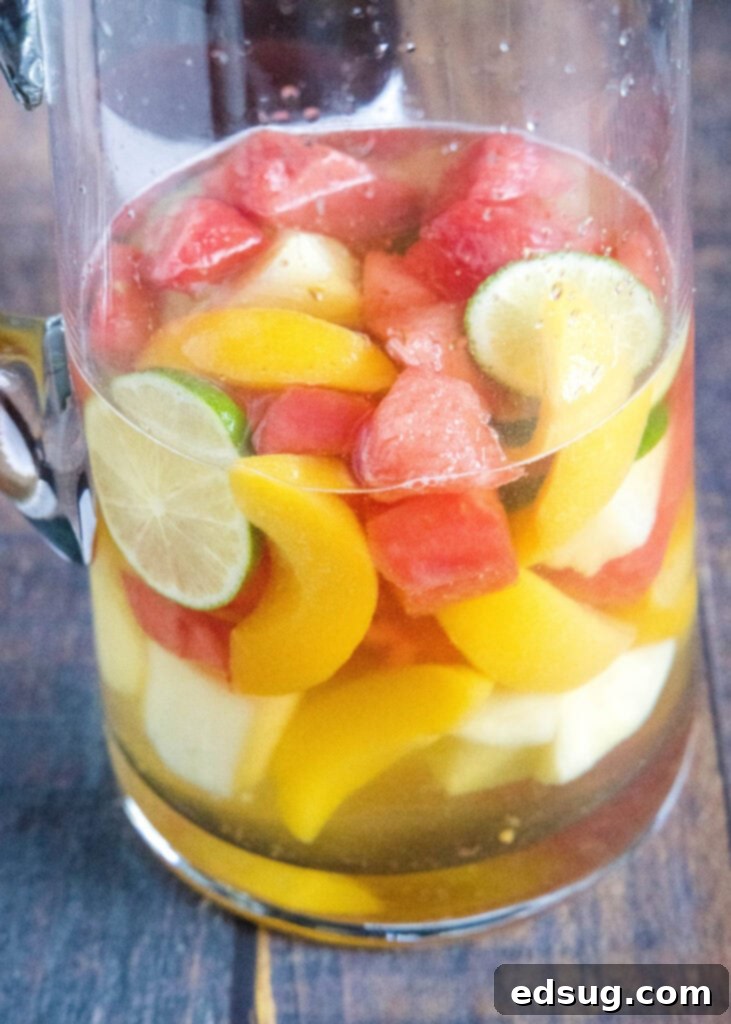 Sun-Drenched Sangria 6 a pitcher of summer fruit sangria