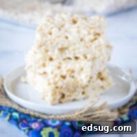 cropped close up stacked cereal treats on a plate