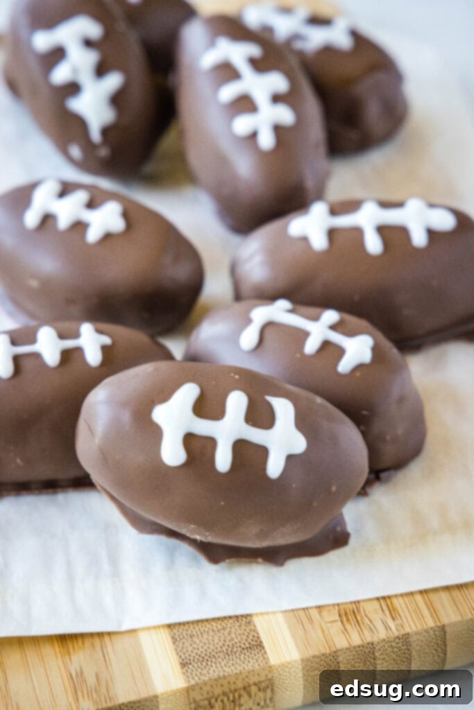 Peanut butter footballs beautifully arranged on a serving board for game day