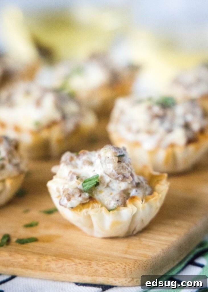 Savory Sausage Cups 2 closeup of cheesy sausage bite