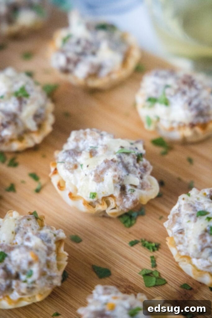 Savory Sausage Cups 6 sausage cups arranged on cutting board
