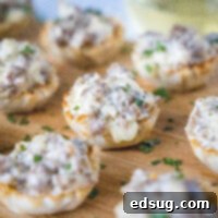 cropped close up sausage cup on cutting board