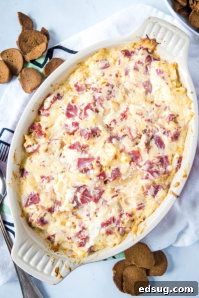 Hot Reuben Dip 2 Looking down on a bubbling baking dish filled with hot Reuben Dip, ready to be served.