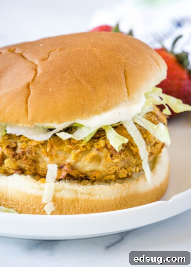 The Ultimate Air Fryer Crispy Chicken Sandwich 6 Chicken sandwich with mayo and lettuce on a plate