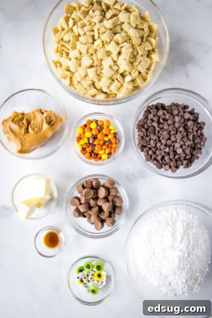 Spooky Halloween Muddy Buddies 3 halloween muddy buddy ingredients laid out on a counter