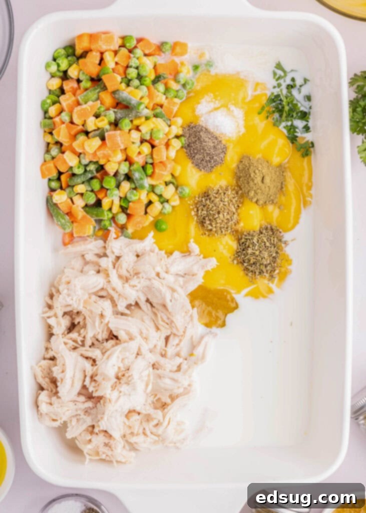 ingredients for chicken pot pie casserole in baking dish