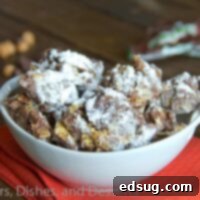 Milky Way Cosmic Clusters 1 Milky Way Puppy Chow in a white bowl, coated in powdered sugar
