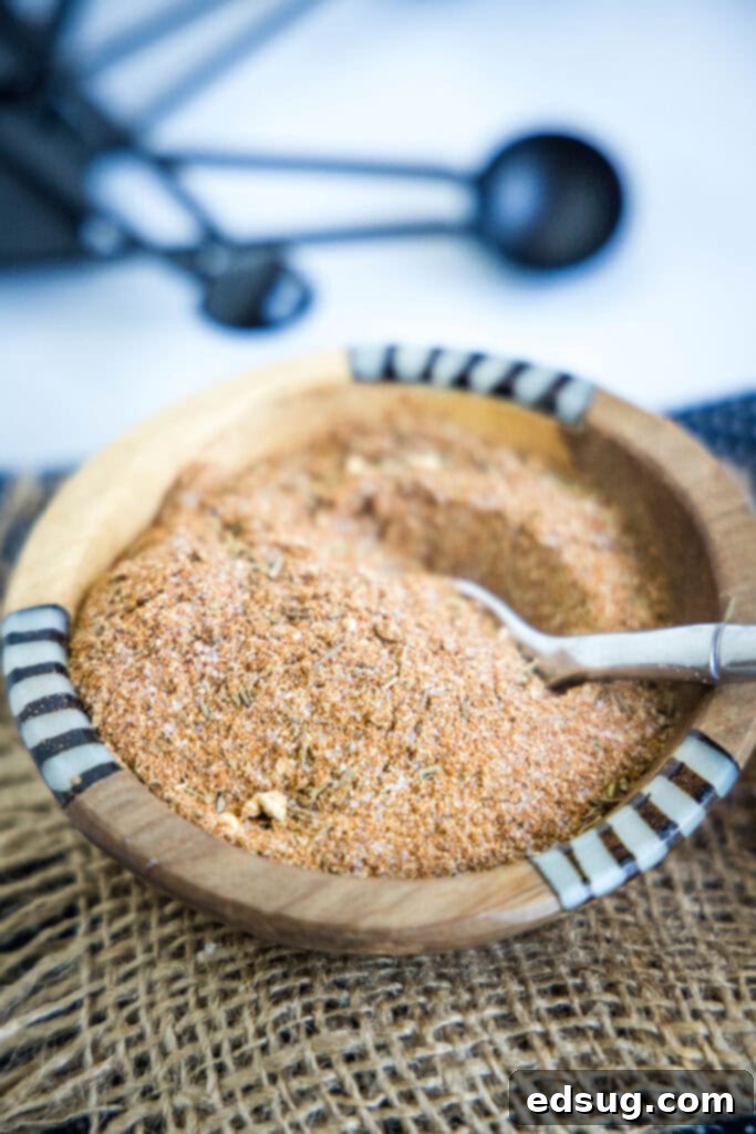 Bring the Bayou Home: Homemade Cajun Blend 6 Homemade Cajun seasoning presented in a small, rustic wooden bowl, ready to be enjoyed.