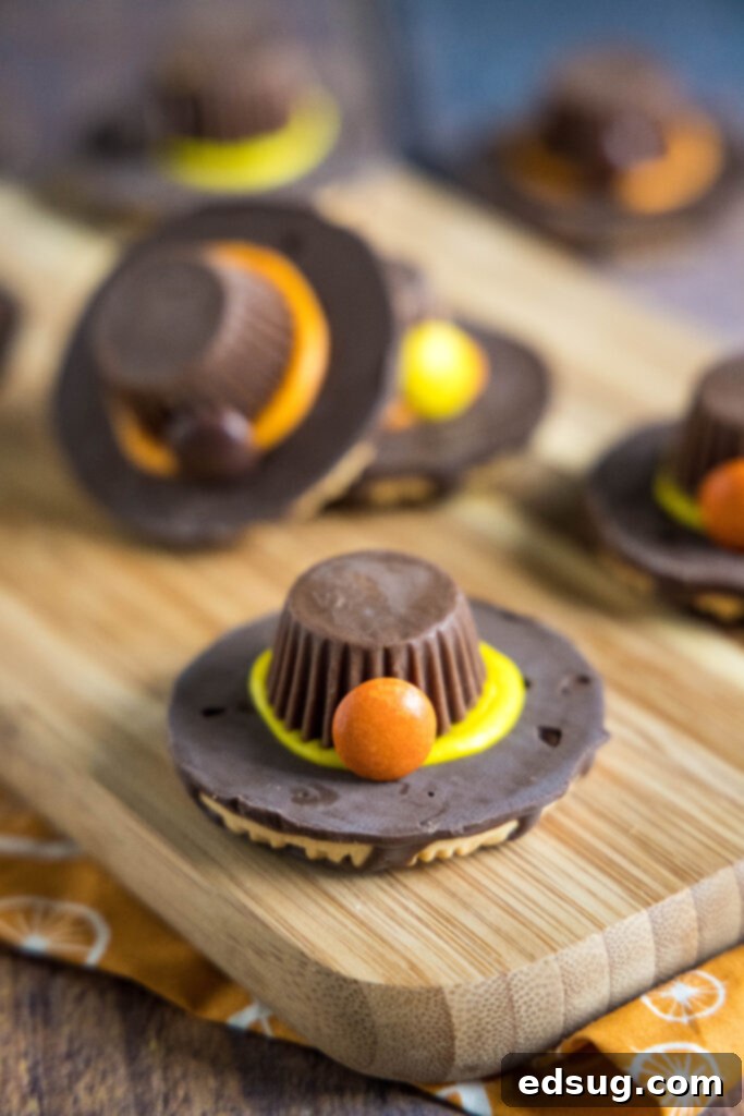 Charming Pilgrim Hat Delights 6 pilgrim hat cookies on a table